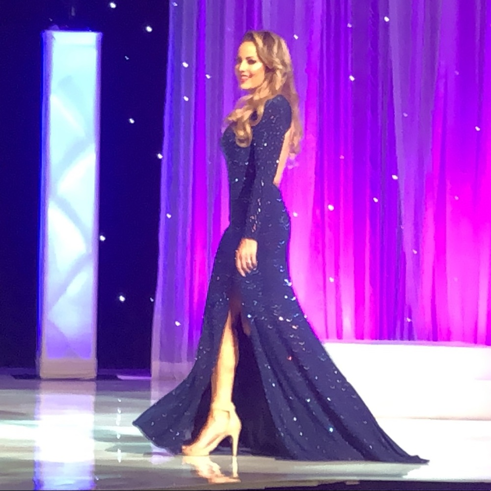 Stunning Tony Bowls gown covered in AB Crystals. Elegant keyhole back.